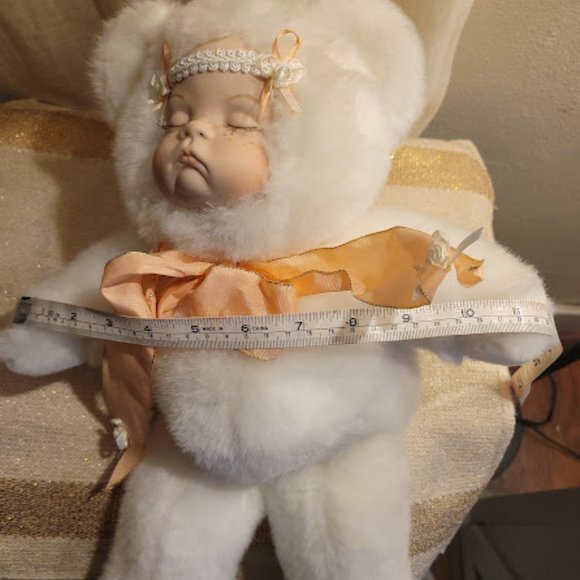 Cute, realistic baby doll in bear suit - Picture 7 of 8